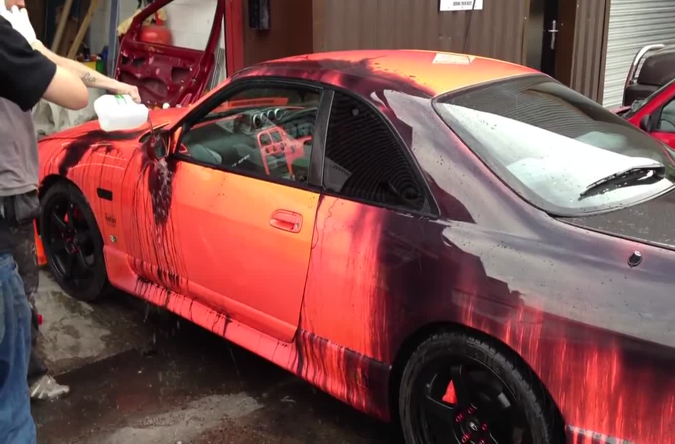 A Nissan Skyline painted with heat sensitive color changing paint.