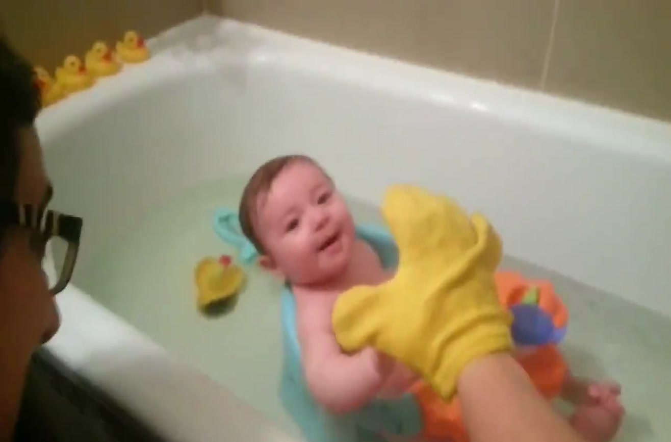 Baby Laughs While Taking A Bath.