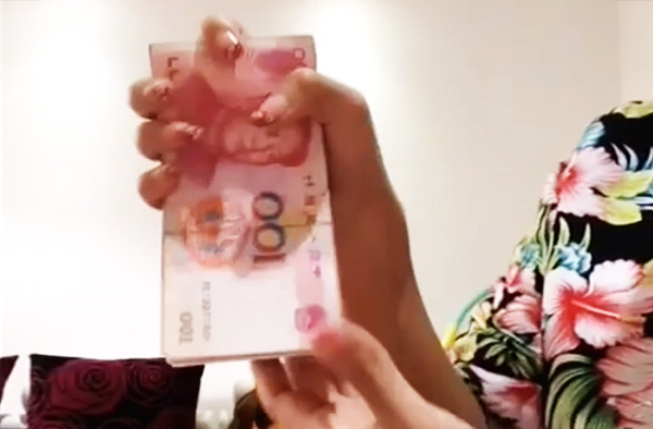 lady-demonstrates-the-fastest-way-to-count-a-stack-of-money