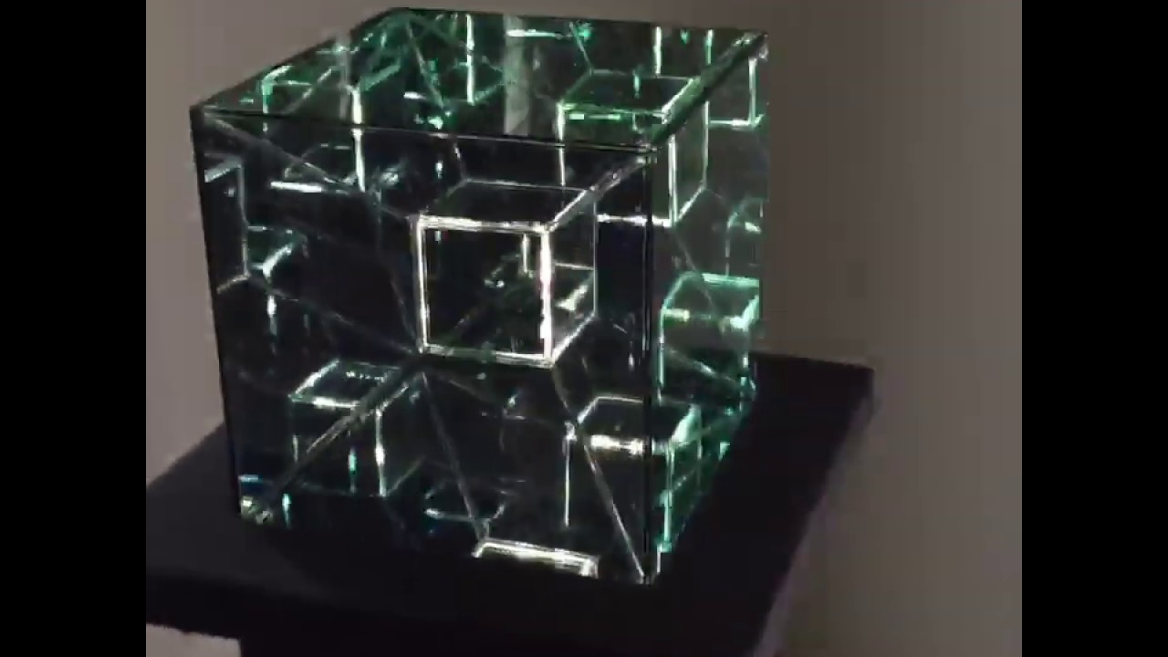 A hypercube 4th dimension infinity mirror art sculpture.