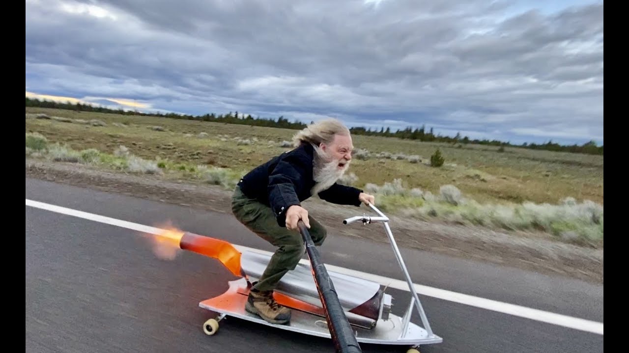 Crazy Rocket Man riding hisrocket board.