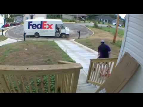 Funny FedEx driver amuses himself.